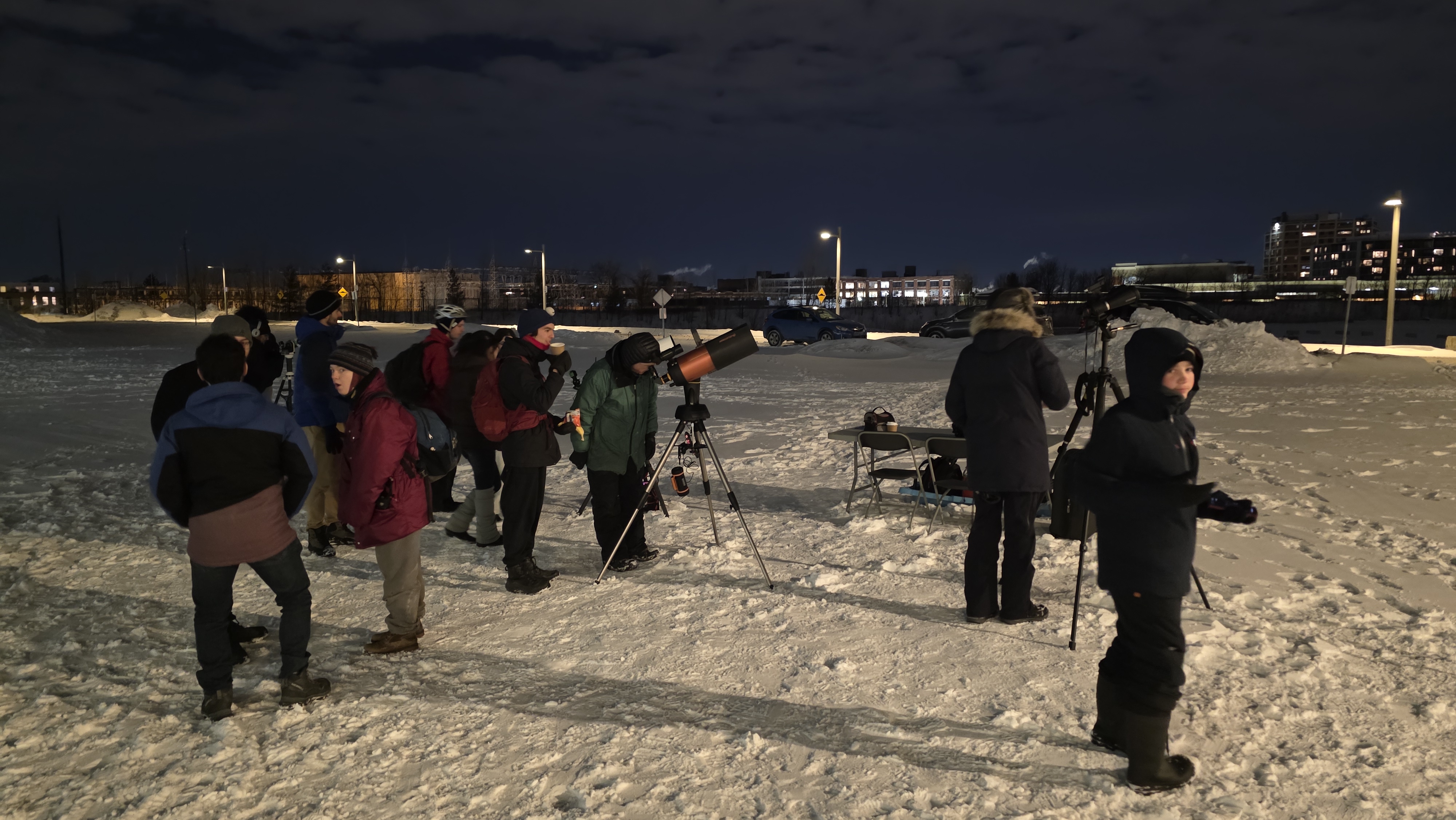 Participants outdoors during the high-school telescope observing session.