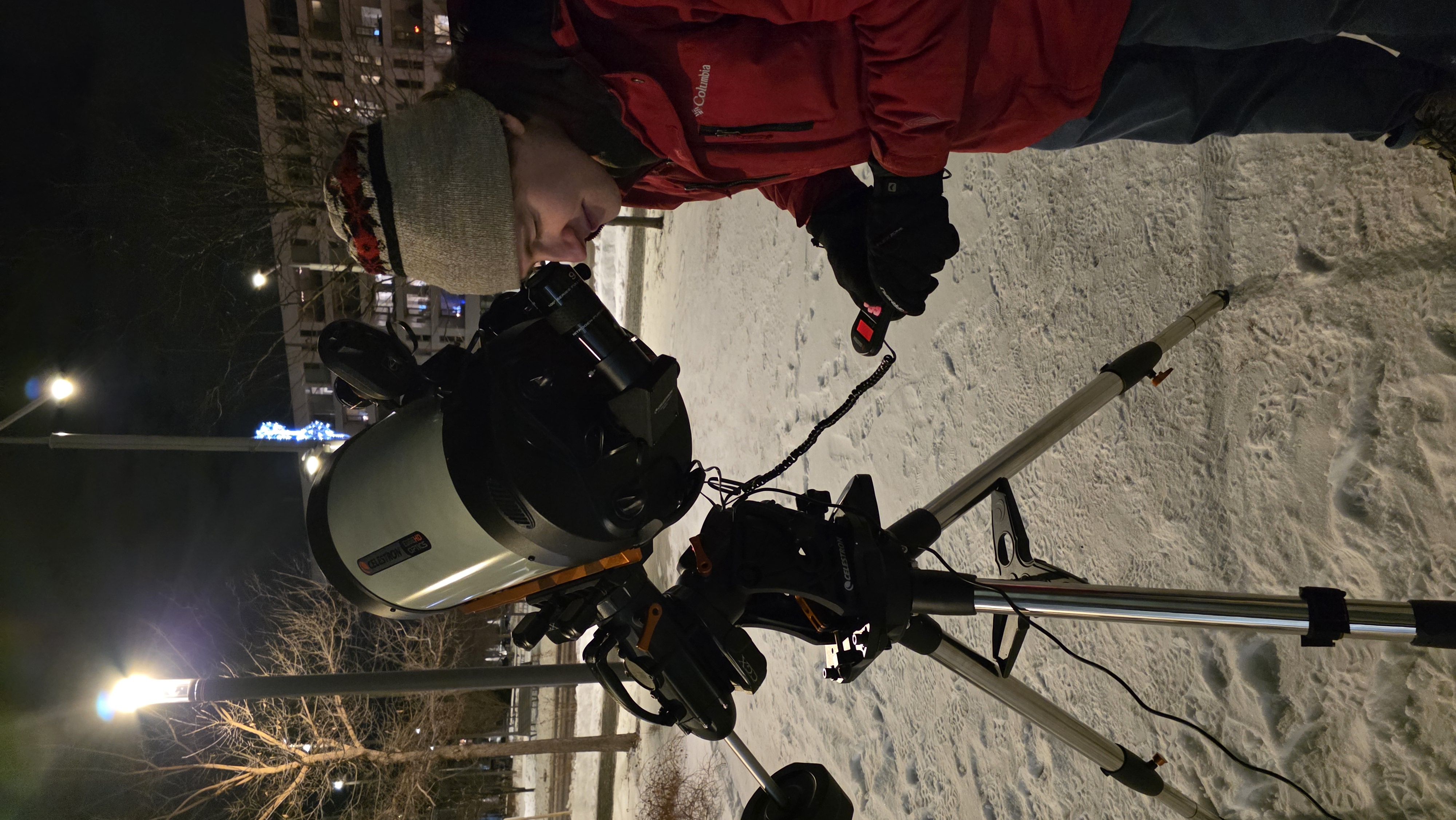 Students gathering near the telescope during the outdoor observing portion of the event.