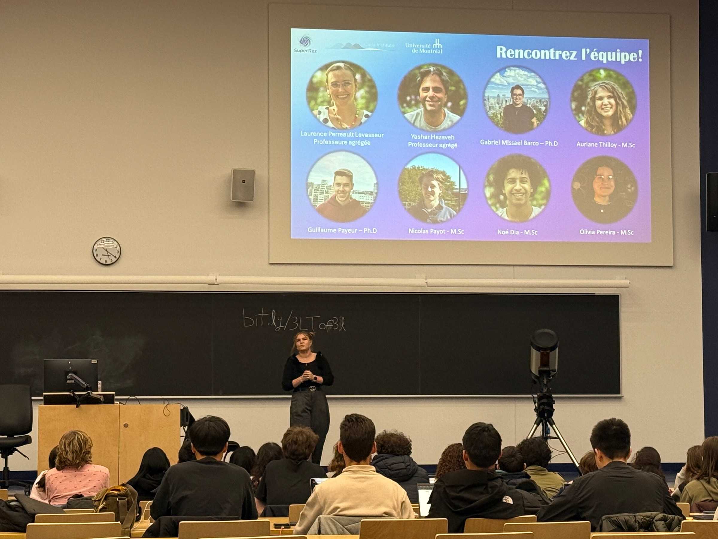 Students attending the SuperRez outreach presentation in a lecture hall.